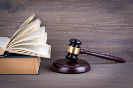 83666164 wooden gavel and books in background law and justice concept u7Zscd
